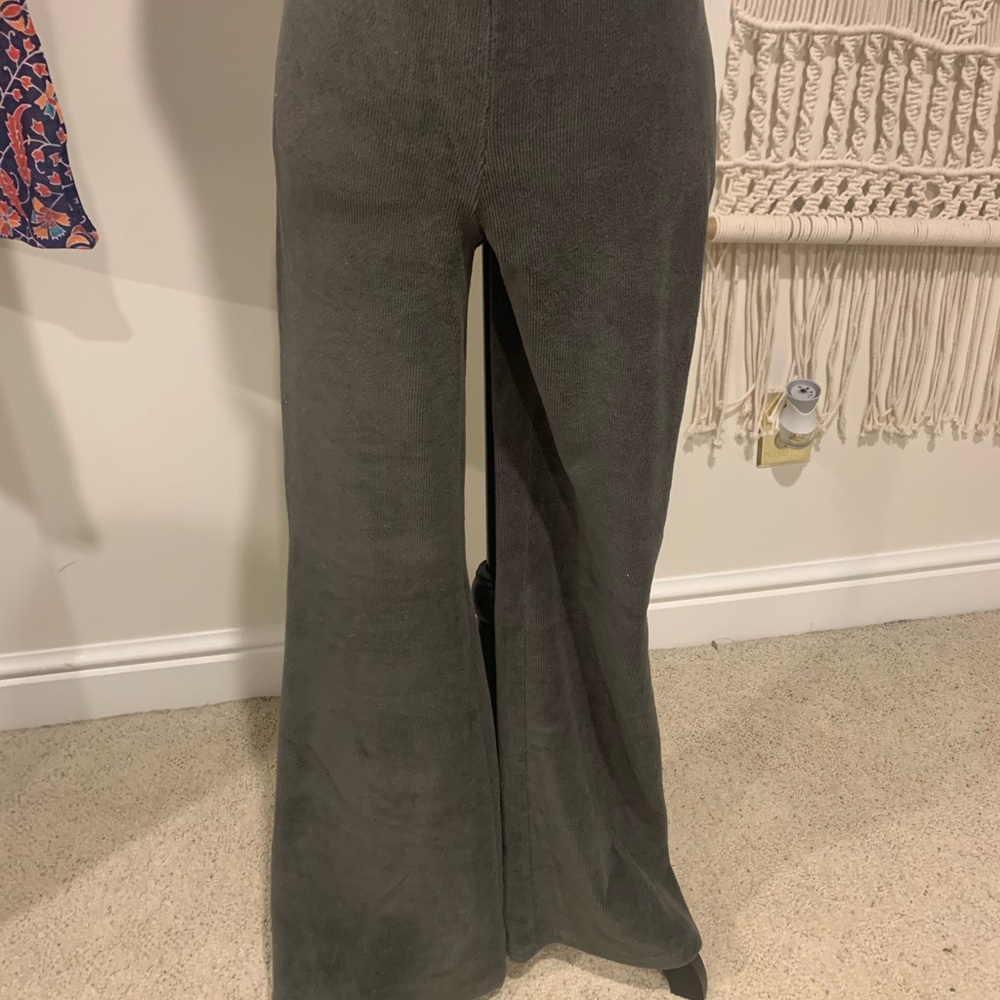 Olive green velvet flair pants from American Eagle